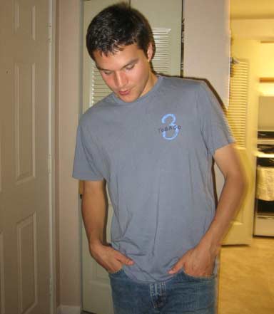 Brian Cook looks down on the other search results.